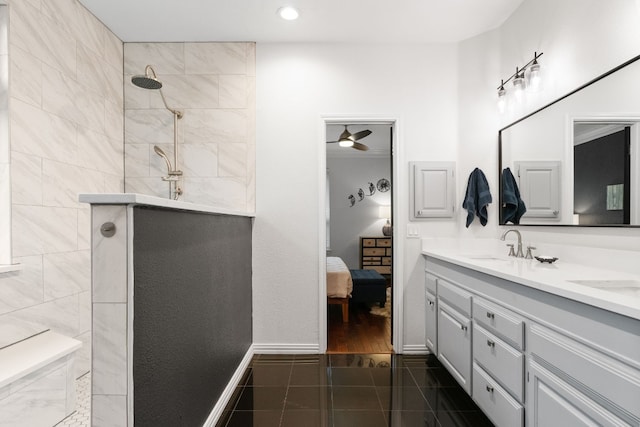 6136 Oliver Loving Trl, Austin, TX 78749 - ensuite bathroom featuring double vanity, a walk in shower, recessed lighting, and ceiling fan