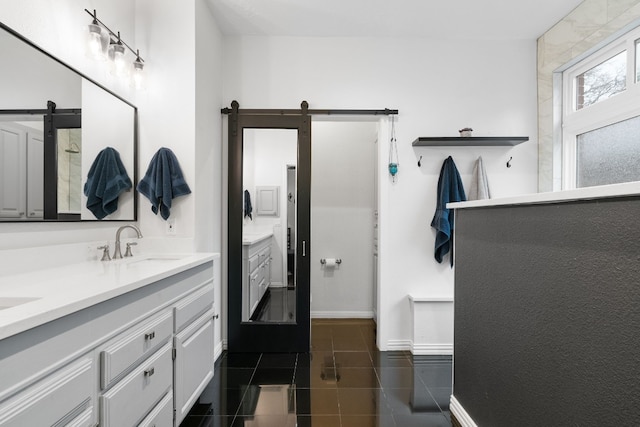 bathroom with vanity and tile patterned floors