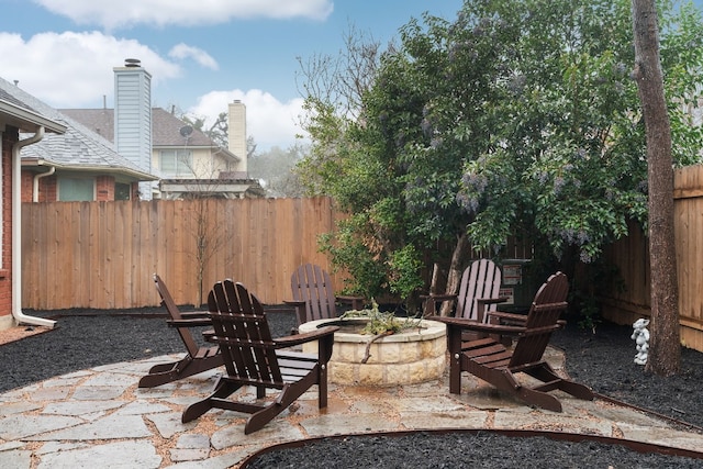 view of patio featuring an outdoor fire pit