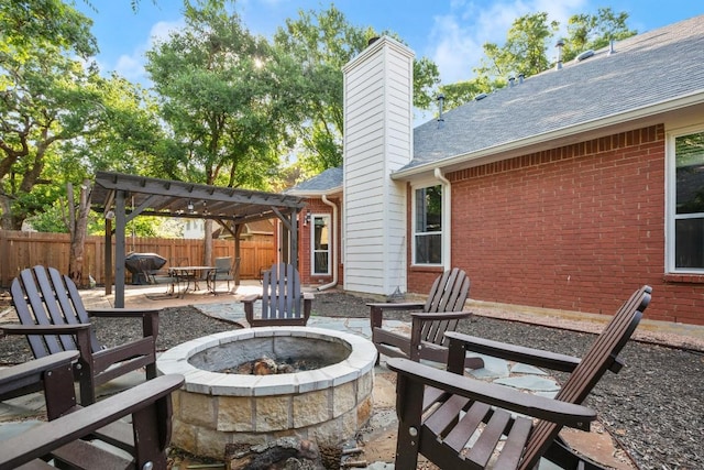 6136 Oliver Loving Trl, Austin, TX 78749 - view of patio with an outdoor fire pit, a pergola, and area for grilling