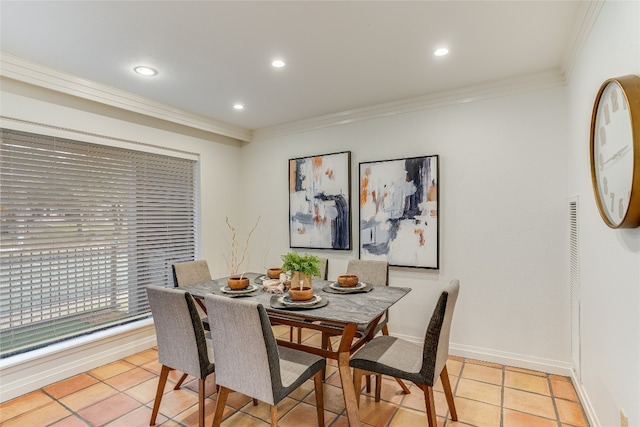 tiled dining space with crown molding