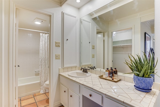 full bathroom with shower / bath combination with curtain, vanity, toilet, and tile patterned flooring