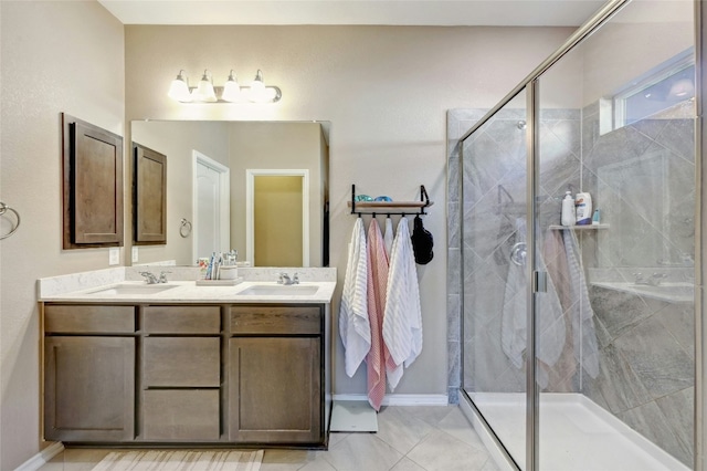 bathroom featuring vanity and a shower with shower door