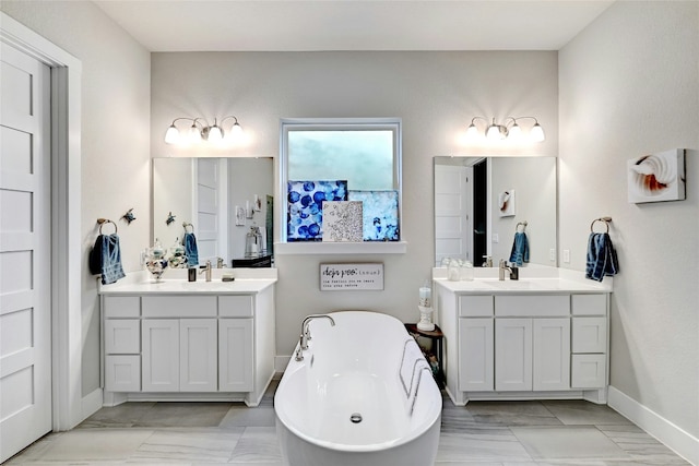 bathroom featuring vanity and a bathtub