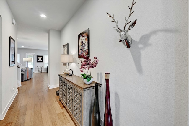 hall with light wood-type flooring