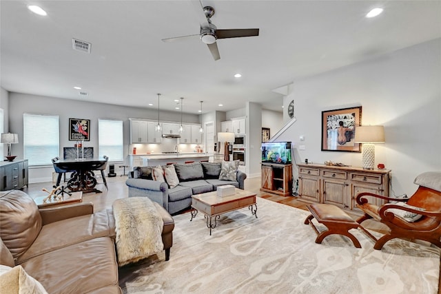 living room with ceiling fan