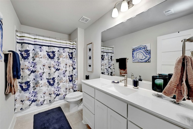 bathroom featuring tile patterned flooring, vanity, a shower with curtain, and toilet