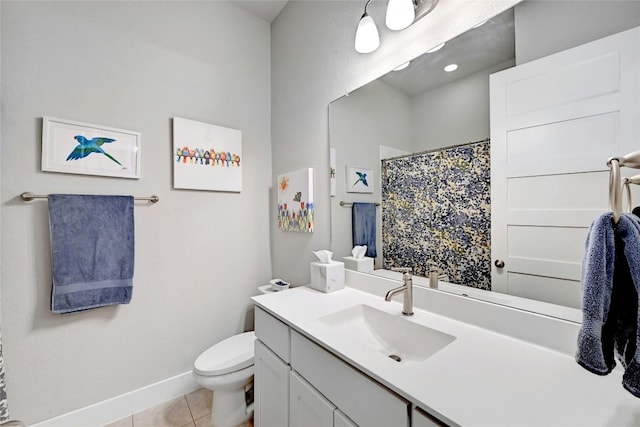 bathroom with tile patterned flooring, vanity, curtained shower, and toilet