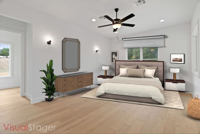 bedroom featuring ceiling fan and light hardwood / wood-style flooring