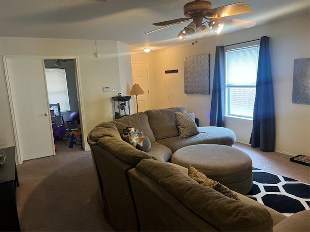 living room with carpet floors and ceiling fan