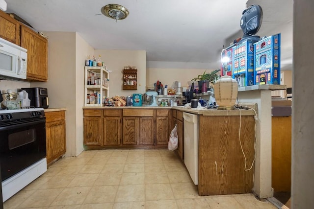 kitchen with white appliances and kitchen peninsula