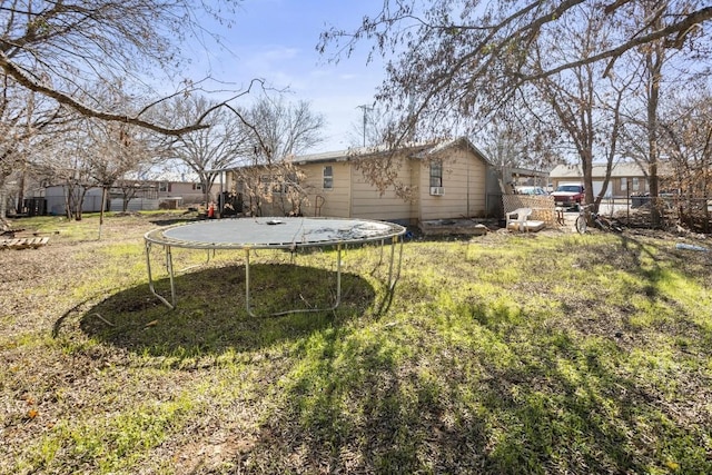 view of yard with a trampoline