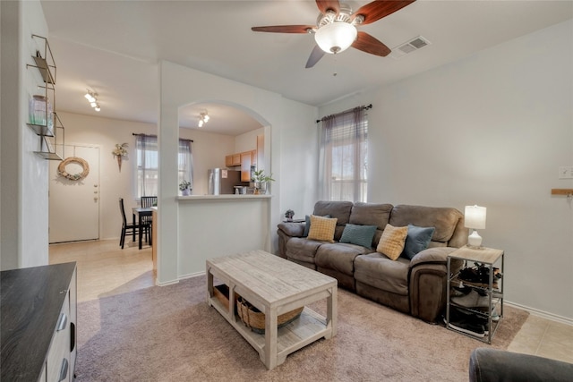 living room with ceiling fan