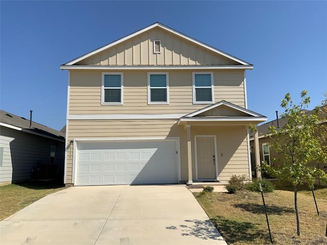 117 Citrine Crst, Maxwell, TX 78656 - view of front of property with board and batten siding, a garage, and concrete driveway