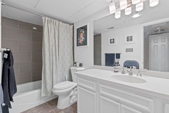 full bathroom with vanity, toilet, and shower / tub combo