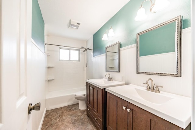 full bathroom featuring shower / bath combination, vanity, and toilet