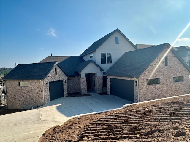 view of front of property featuring a garage