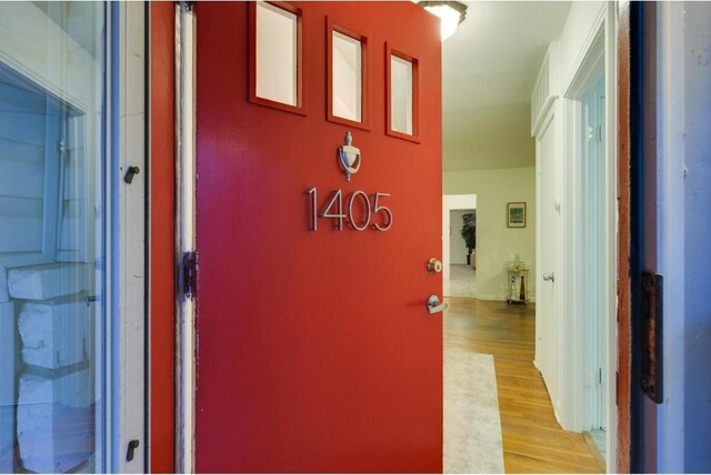 1405 Brentwood St, Austin, TX 78757 - hallway with light wood-style flooring