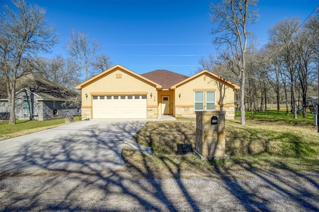 ranch-style home with a garage and a front lawn