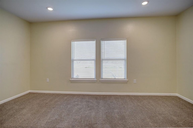 view of carpeted spare room