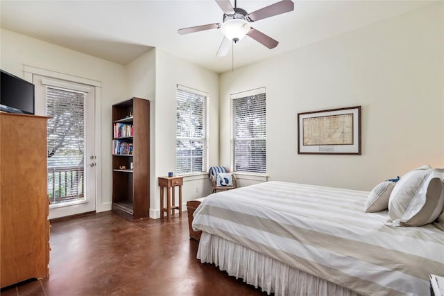 bedroom with ceiling fan and access to exterior