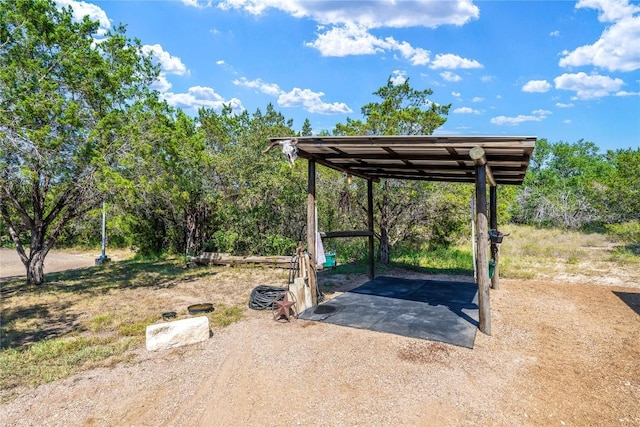 view of yard with a carport