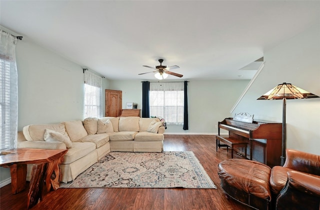 living room with hardwood / wood-style flooring and ceiling fan