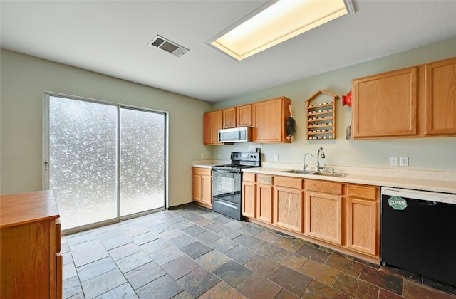 kitchen featuring sink and black appliances