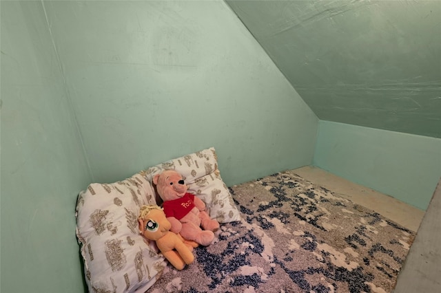 bedroom featuring vaulted ceiling