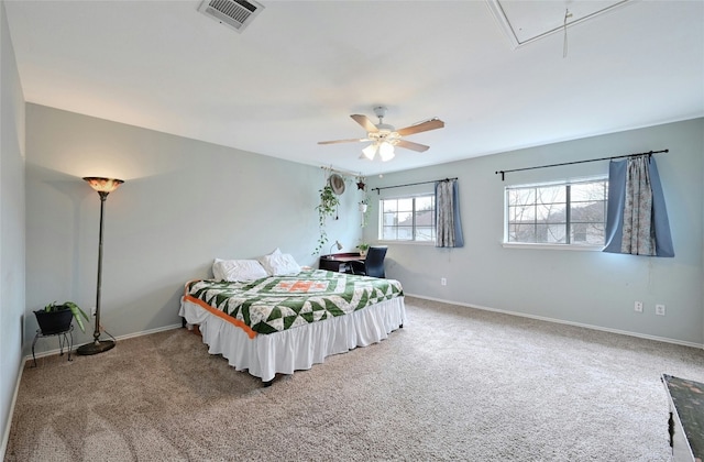 carpeted bedroom featuring ceiling fan