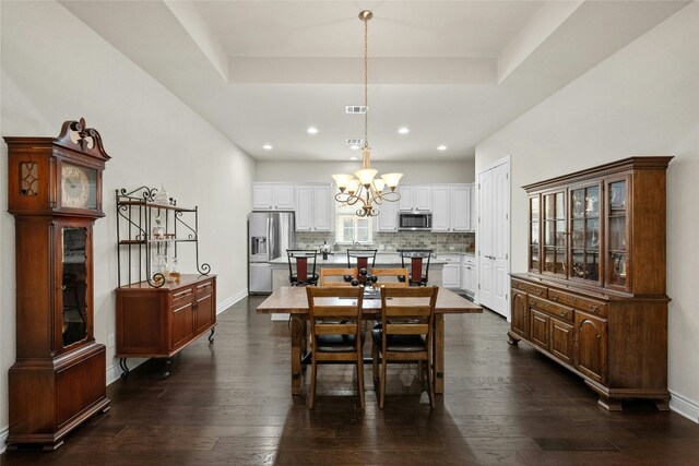 204 Delfino Cir, Lakeway, TX 78734 - dining area with a chandelier, recessed lighting, and dark wood finished floors