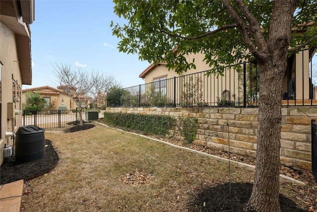 view of yard with central AC unit