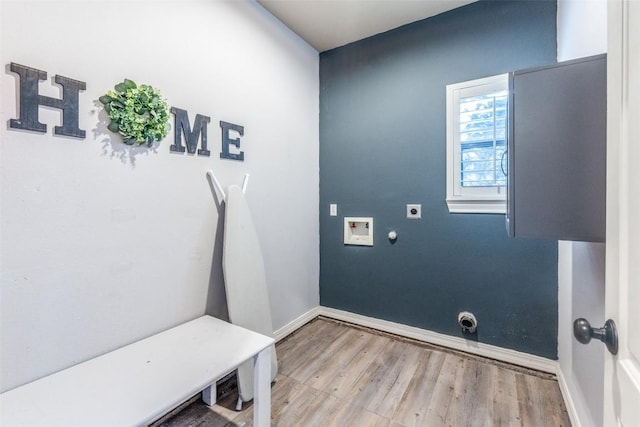 mudroom with light hardwood / wood-style flooring