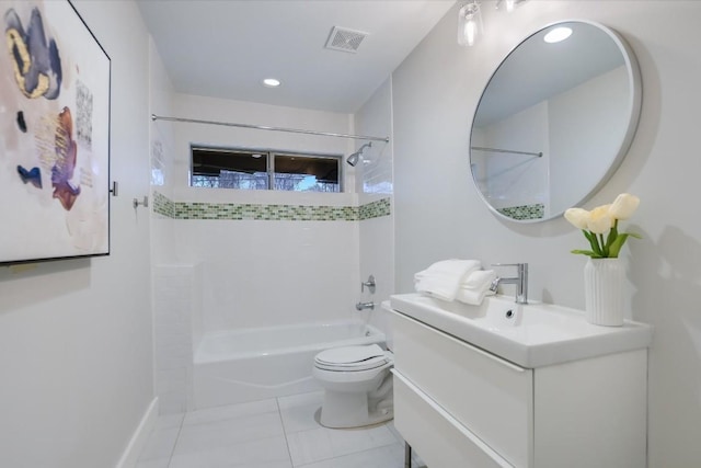 full bathroom featuring vanity, tiled shower / bath combo, tile patterned floors, and toilet