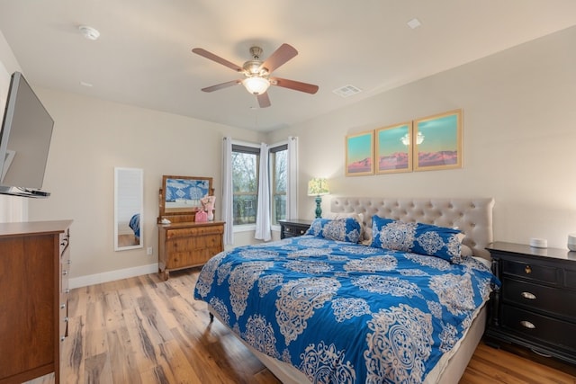 3301 Rockhurst Ln, Austin, TX 78723 - bedroom featuring light wood-type flooring and a ceiling fan