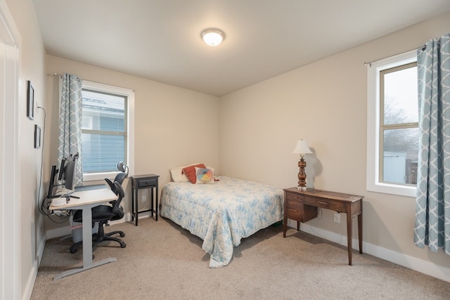 3301 Rockhurst Ln, Austin, TX 78723 - bedroom with light carpet and multiple windows