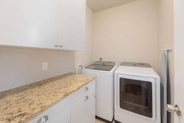 3301 Rockhurst Ln, Austin, TX 78723 - washroom featuring independent washer and dryer and cabinet space