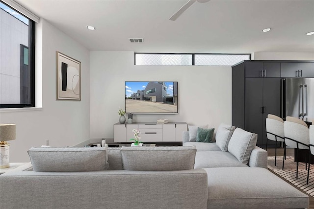 living room featuring ceiling fan