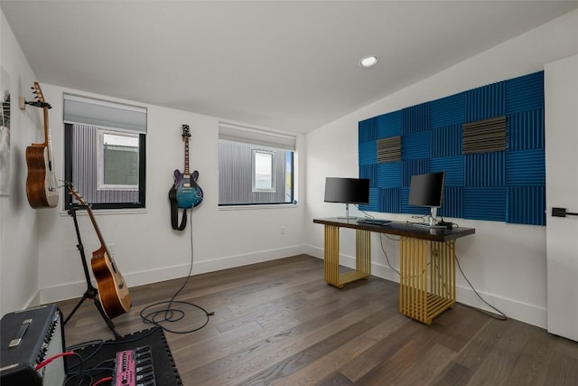 office area with lofted ceiling and dark hardwood / wood-style floors