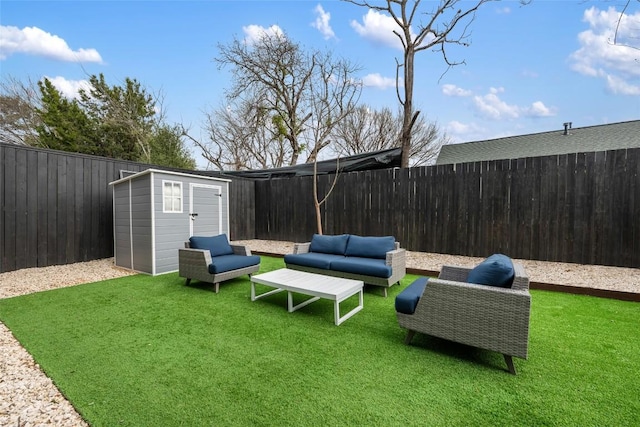 view of yard with an outdoor living space and a shed