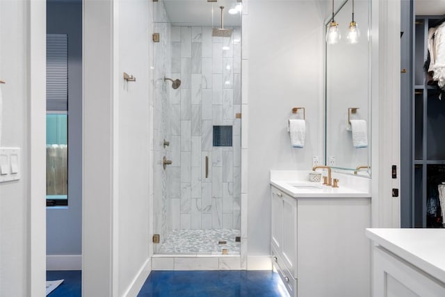 bathroom with vanity and walk in shower