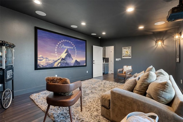 home theater with dark wood-type flooring