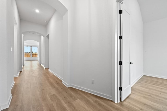 586 Biscayne Bay Bnd, Kyle, TX 78640 - hall featuring arched walkways and wood finished floors