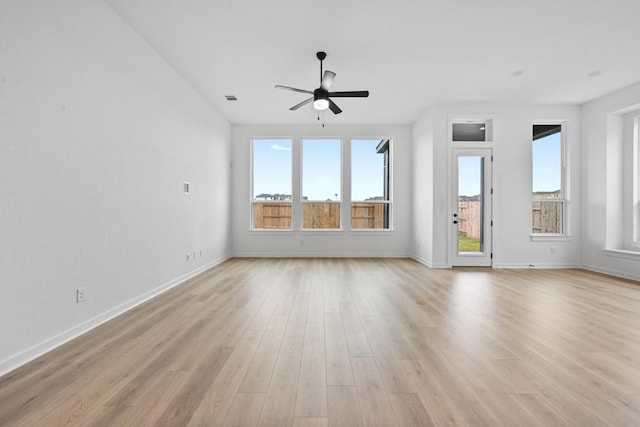 586 Biscayne Bay Bnd, Kyle, TX 78640 - spare room with ceiling fan, plenty of natural light, and light wood-style floors