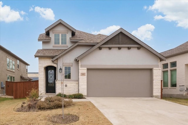 craftsman-style house with stucco siding, stone siding, roof with shingles, concrete driveway, and an attached garage