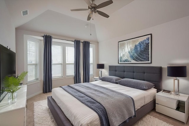 bedroom featuring baseboards, visible vents, lofted ceiling, ceiling fan, and light colored carpet