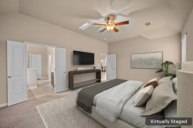 bedroom with ceiling fan, light colored carpet, and lofted ceiling