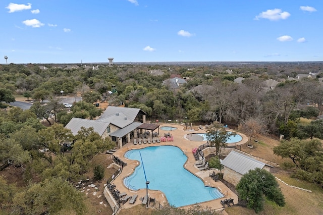 view of swimming pool featuring a patio area