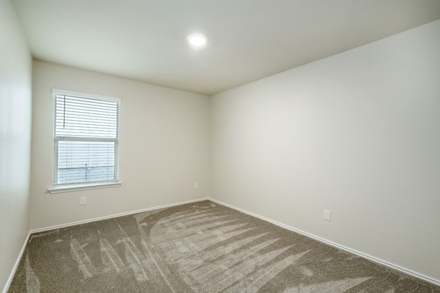 spare room with carpet flooring