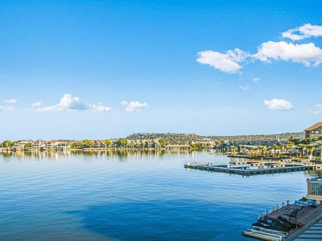 view of water feature with a dock